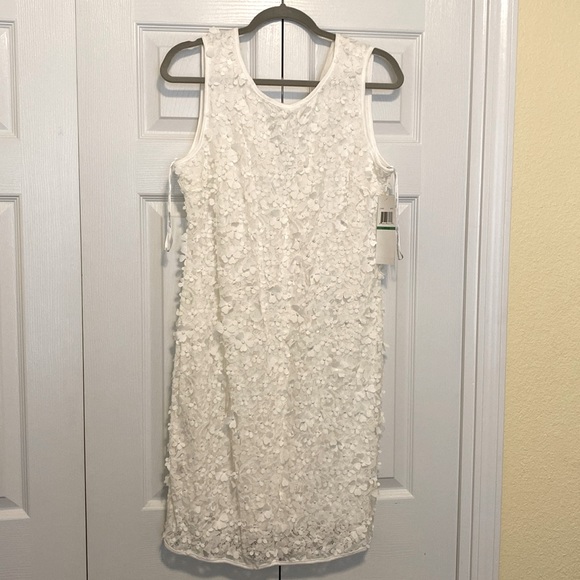 Dresses & Skirts - Pretty white dress size large Nina Leonard with white flowers